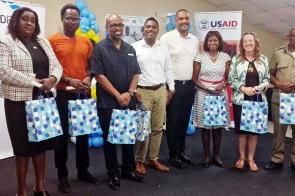Government Ministers Joachim Henry and Jeremiah Norbert with SSDF, NSDC, BCF and USAID representatives