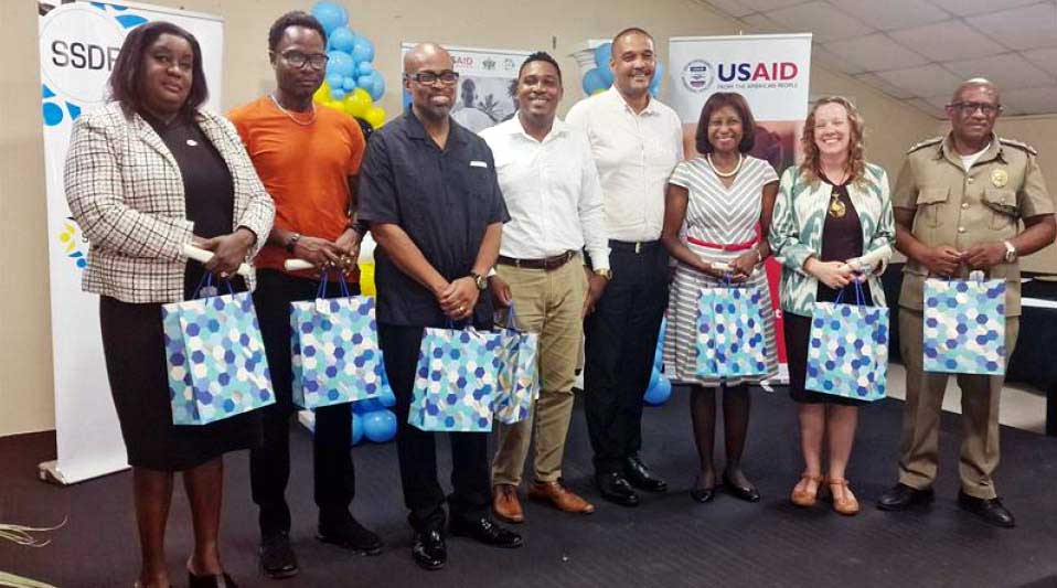 Government Ministers Joachim Henry and Jeremiah Norbert with SSDF, NSDC, BCF and USAID representatives