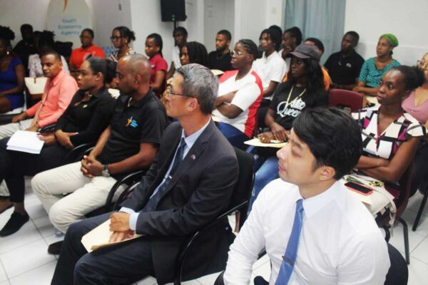 (From right to left, front row): Mr. Daniel Lee, Chief of the Taiwan Technical Mission (TTM) in Saint Lucia; H.E. Peter Chia-Yen Chen, Taiwan’s Ambassador to Saint Lucia; Mr. Bryan Vidal, Chief Executive Officer of the YEA; Mrs. Khrystal Riviere, Chief Operations Officer of YEA; and Mr. Rohan Lubon, Acting Deputy Permanent Secretary in the Ministry of Youth Development and Sports; join participants at the YEA’s registration and orientation session for the Business Planning Training on Friday, June 21, 2024.