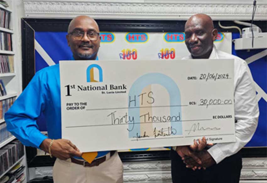 L-R: Mr Solomon Emmanuel of 1st National Bank and Mr. Stanley Lucien HTS Representative