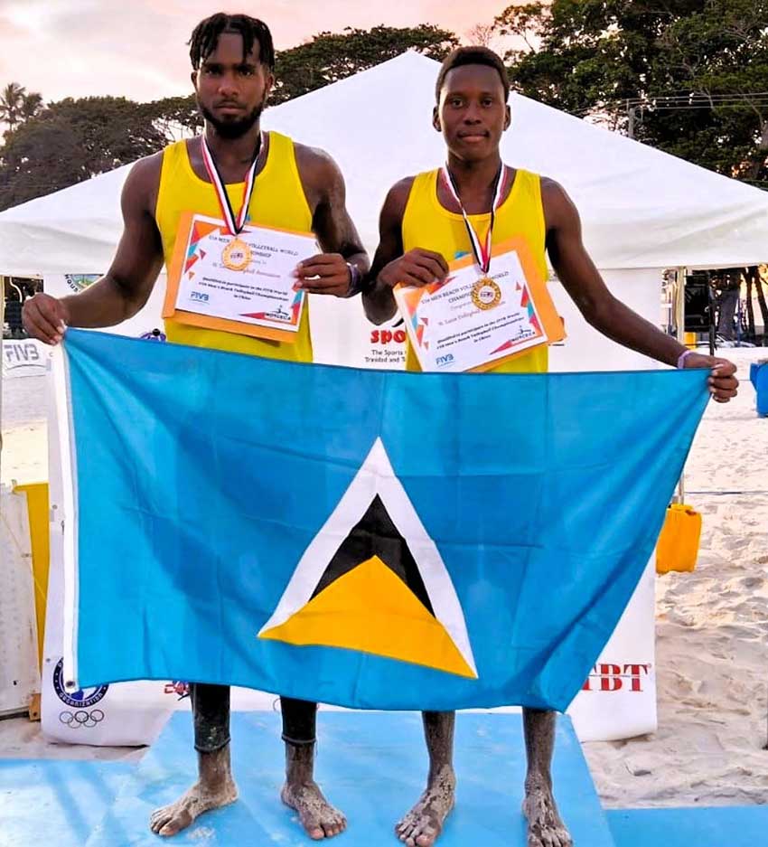 Team Saint Lucia displays gold medals on the podium 