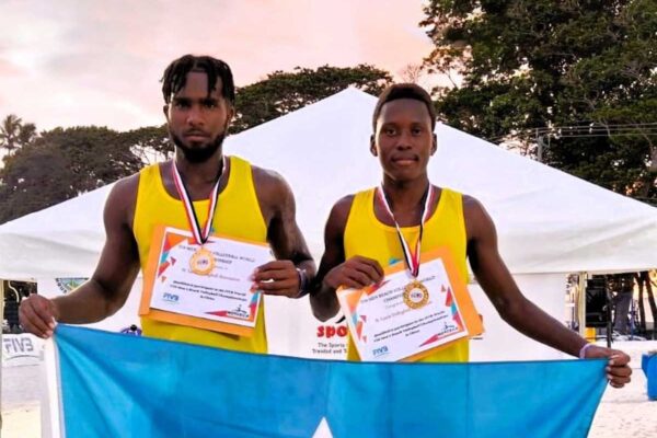 Team Saint Lucia displays gold medals on the podium