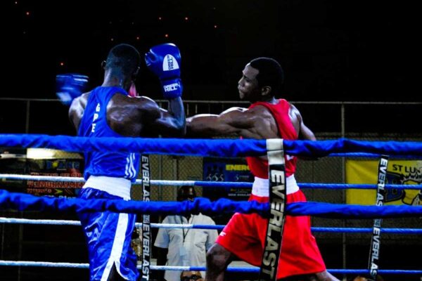 Saint Lucian top rated-boxer Keegan Mortley (red) in action.