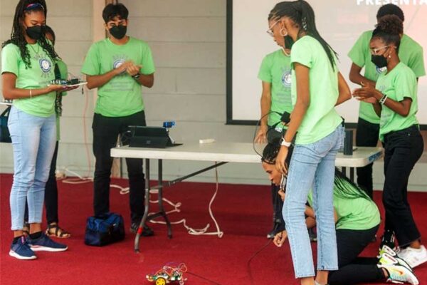 Students engaging in an electronics presentation during last year’s workshops