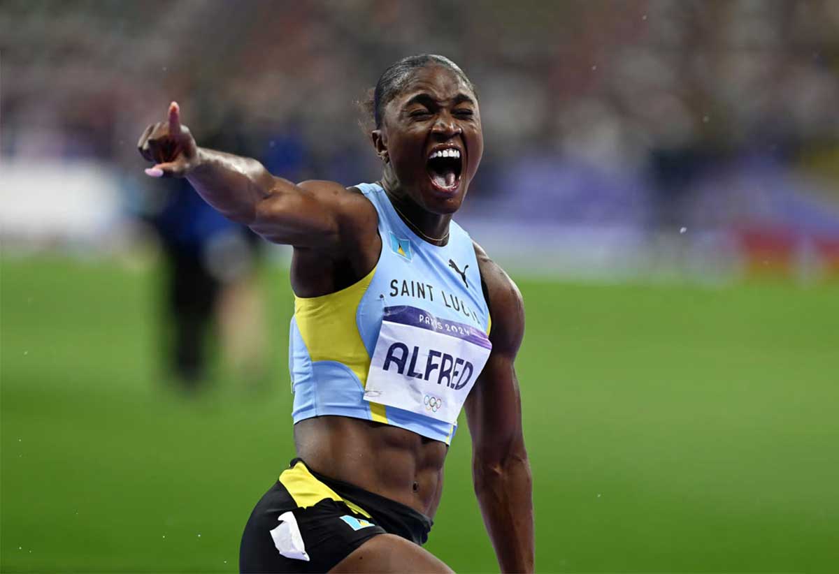 An elated Julien Alfred after winning her first Olympic gold medal.