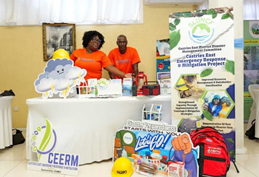 Members of the Castries East District Disaster Management Committee showcase their emergency preparedness project