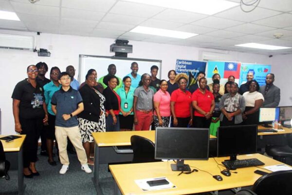 Participants and representatives from the Taiwan Technical Mission (TTM) and Caribbean Digital Transformation Project (CARDTP) pose for a group photo following the conclusion of the AI training workshop at the National ICT Centre on Friday, July 26, 2024