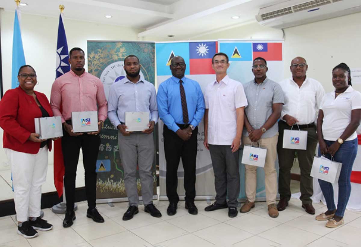 H.E. Peter Chia-Yen Chen, Taiwan’s Ambassador to Saint Lucia, joins Hon. Moses Jn. Baptiste, Minister for Health, Wellness and Elderly Affairs, and the six participants in the 2024 Taiwan Alumni Workshop Program, at the ceremony held at Union Orchid Gardens on Wednesday, September 4, 2024, for a group photo.