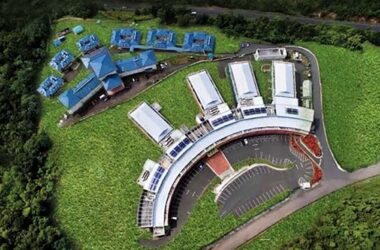 Aerial view of the medical complex near the Millennium Highway with OKEU Hospital at the forefront.