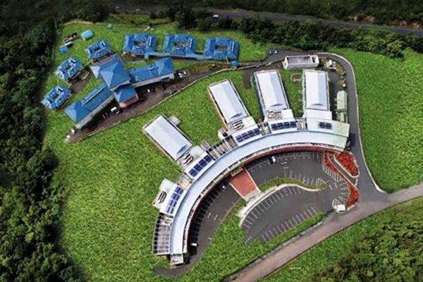 Aerial view of the medical complex near the Millennium Highway with OKEU Hospital at the forefront.