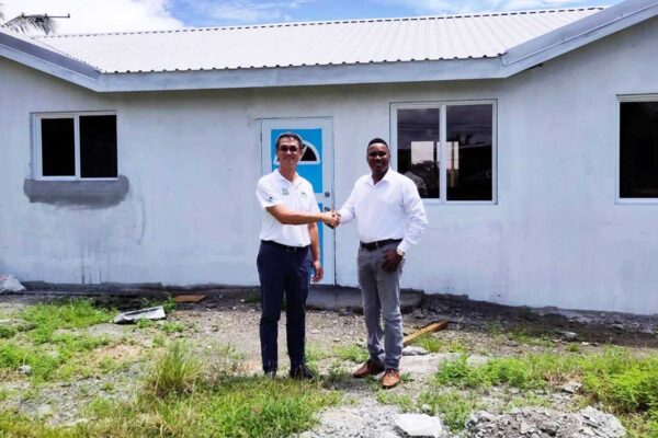 H.E. Peter Chia-Yen Chen, Taiwan’s Ambassador to Saint Lucia, and Hon. Jeremiah Norbert, Minister in the Office of the Prime Minister with Responsibility for Crime Prevention and Persons with Disabilities and Parliamentary Representative for Micoud North, shake hands outside the new Patience Early Childhood Development Centre which is now under construction during their site visit on Wednesday, September 11, 2024.