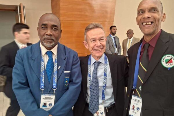 Mr. Alfred Emmanuel, President of the St. Lucia Olympic Committee (SLOC) Inc., at far left, was elected as a representative of Group 2, of which Saint Lucia is a part. Pictured with him are two other representatives at the meeting in Paraguay.