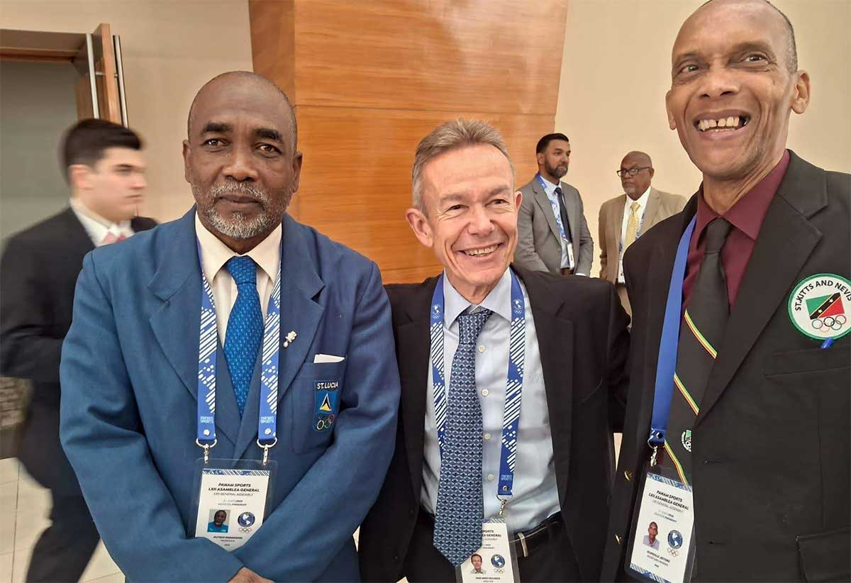 Mr. Alfred Emmanuel, President of the St. Lucia Olympic Committee (SLOC) Inc., at far left, was elected as a representative of Group 2, of which Saint Lucia is a part. Pictured with him are two other representatives at the meeting in Paraguay.