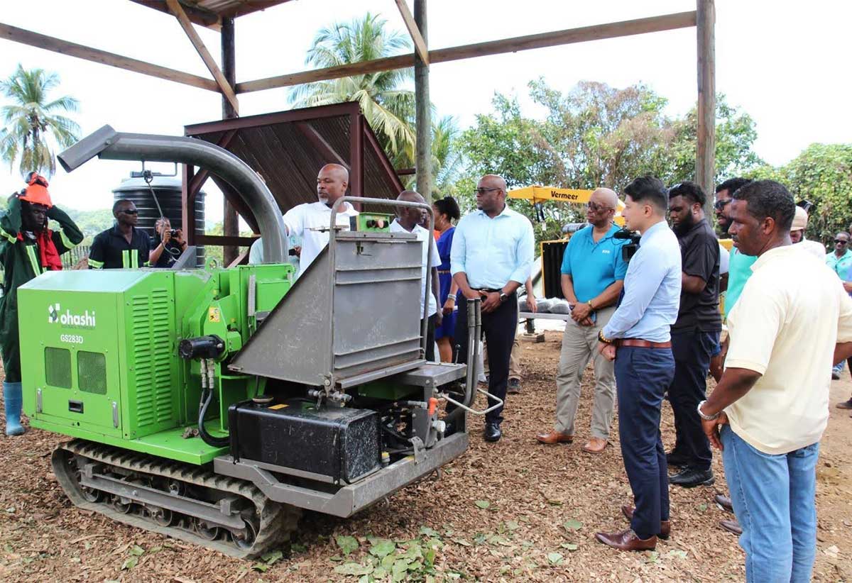 Attendees at last Friday’s Compost Processing Shed unveiling ceremony tour the facility where they got to learn how the composting process works. 