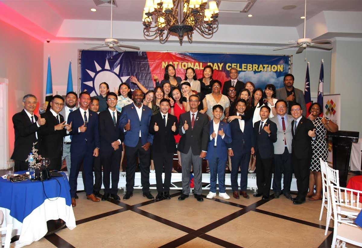 H.E. Peter Chia-Yen Chen, Taiwan’s Ambassador to Saint Lucia, and Mrs. Chen join staff from the Taiwan Embassy and Taiwan Technical Mission and others for a group photo at the reception at Sandals Golf & Country Club on Tuesday evening, October 8, 2024, held in observance of Taiwan’s 113th National Day celebrations. 