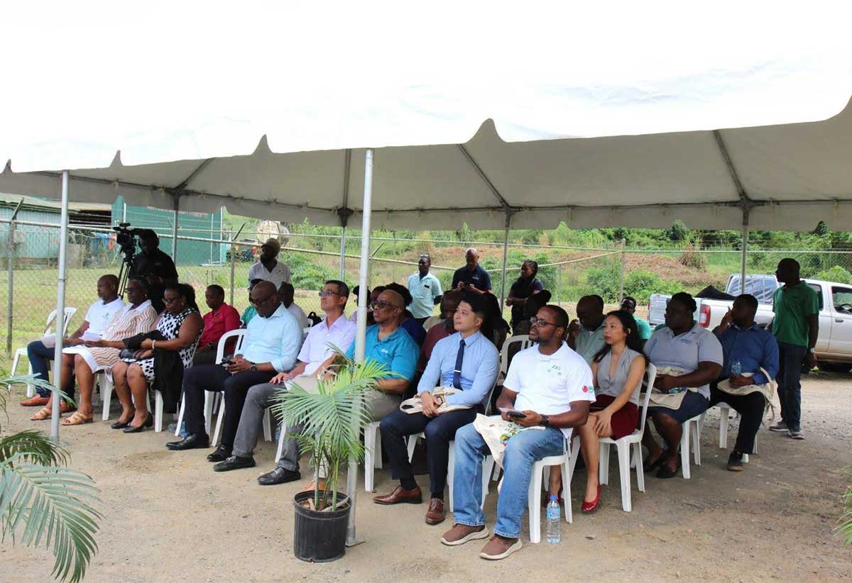 Attendees at last Friday’s Compost Processing Shed unveiling ceremony tour the facility where they got to learn how the composting process works. 