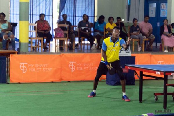 De Andre Calderon serves up the ball during impressive performance in regional table-tennis series