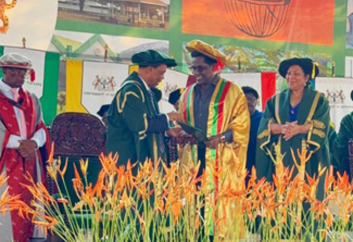 Dr Ramjattan being awarded his Honorary Degree by Chancellor and Vice Chancellor of the University of Guyana, (Professor Edward Green and Professor Paloma Mohmmed Martin) on November 7th, 2024