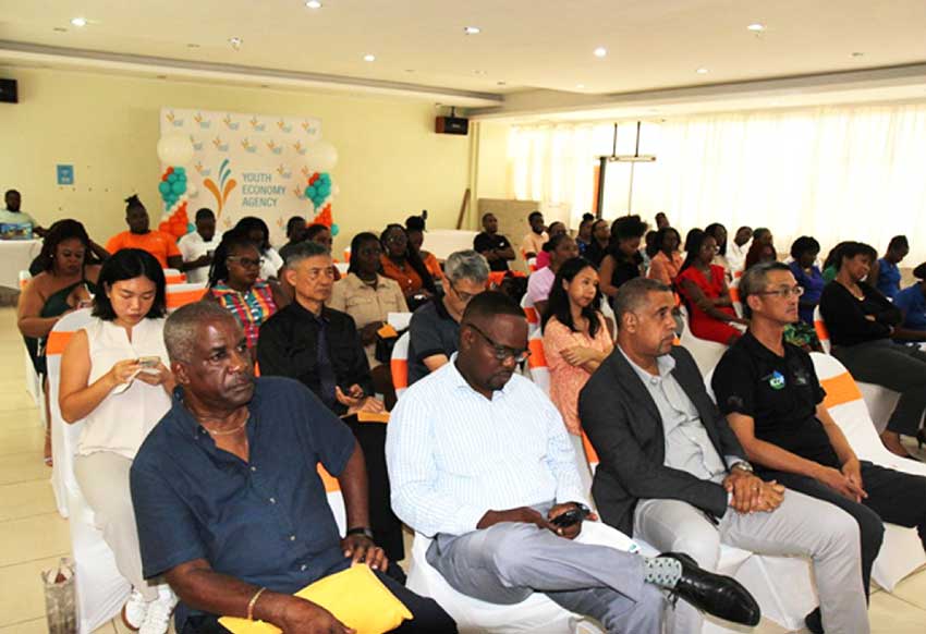 H.E. Peter Chia-Yen Chen, Taiwan’s Ambassador to Saint Lucia, and Mr. Thomas Leonce, Chairperson of the Youth Economy Agency, join other guests and participants at the certificate ceremony held at Union Orchid Gardens on Tuesday, November 5, 2024