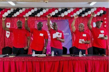 SLP Political Leader Philip J Pierre (centre) flanked by party colleagues at his party’s Annual Conference of Delegates