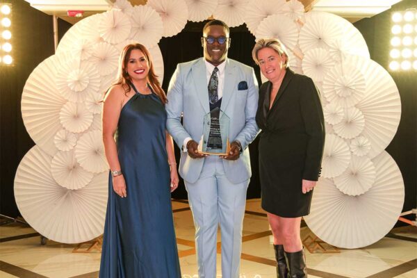 Stephen Price (centre), General Manager of Flow Jamaica, receives a special award on behalf of the Flow Foundation from Inge Smidts (right), Chief Executive Officer, C&W Communications, and Rosario Veras, Executive Director of the Cable & Wireless Charitable Foundation.