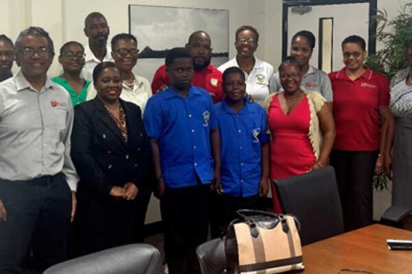 Reps of beneficiary orgs capture the moment with CIBC Country Head N Ollivierre