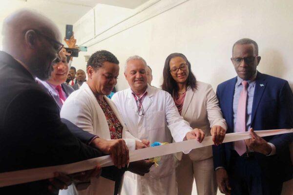 The symbolic ribbon cutting at yesterday’s opening of the Dr Betty Wells Urban Polyclinic