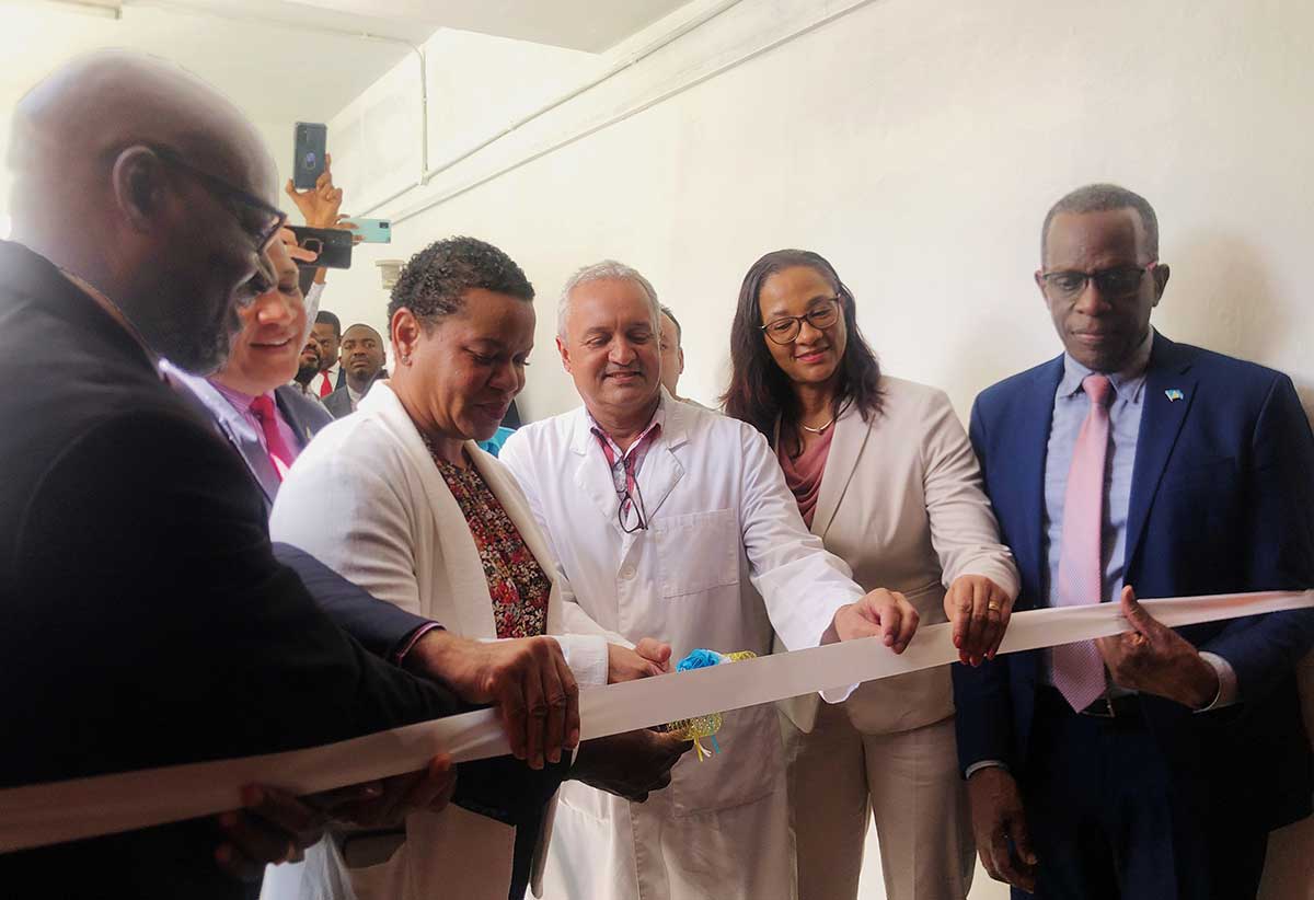 The symbolic ribbon cutting at yesterday’s opening of the Dr Betty Wells Urban Polyclinic 