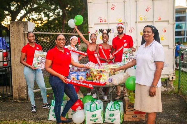 Accompanied by members of Team RUBIS, Account Executive Chriselda Norbal, makes the donation to The Holy Family Children’s Home in Rodney Bay, represented by Sister Anthonia David.