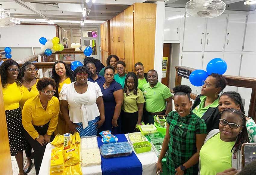 Admin Staff at the Ministry of Education, Commonwealth of Dominica celebrate OECS Colours Day. Photo Credit: MoE.