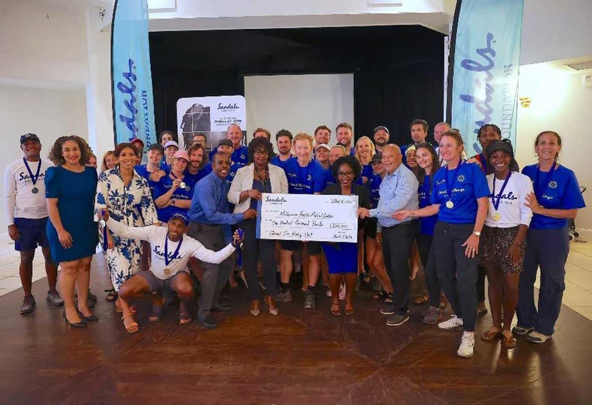 Above: Goal attained! Group of local and international participants in the Sandals Foundation Island Challenge share a special moment with cheque for £100,000 as they present to representatives of the Millenium Heights Medical Complex, alongside partners St. Lucia Tourism Authority and the Saint Lucia Hospitality and Tourism Association Tourism Enhancement Fund.