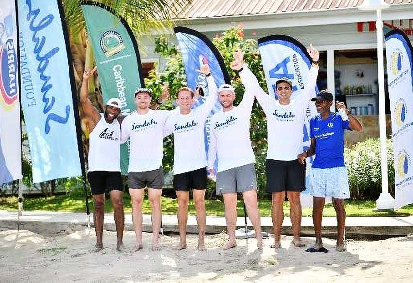 Above: [L-R]: Local participants Julien Toussaint, Tiger Whitely and Sean Ovington representing WeTransfer, Lewis McClymont and Ashley Jones representing Trip Advisor, and local participant Victor Ledger maintain high energy having been the first three teams to complete day 1 of the Sandals Foundation Island Challenge.