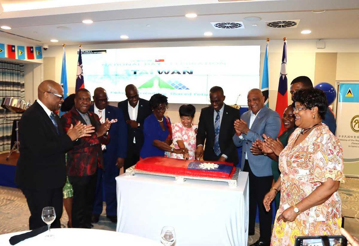 H.E. Nicole Su, Taiwan’s Ambassador to Saint Lucia, and Prime Minister Hon. Philip J. Pierre, join other Government Ministers and Senators and H.E. Dame Pearlette Louisy, Governor General Emerita, for the cake-cutting ceremony at this year’s Taiwan National Day Anniversary Reception held at Harbor Club Thursday, October 9, 2025.