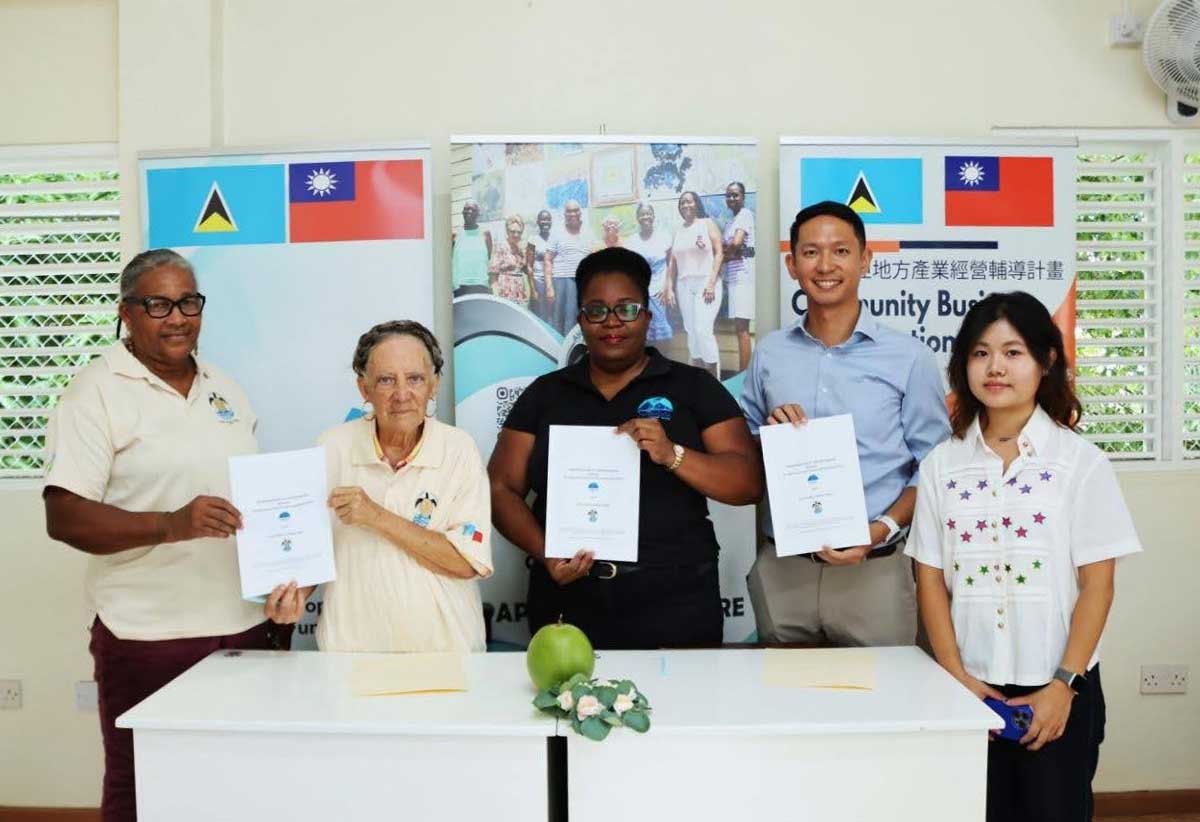 From left to right: Ms. Noella Alexander, Secretary of Anse Kawet Crafters, Mrs. Avice James-Louisy, President of Anse Kawet Crafters, Ms. Stephia Hippolyte, Manager for Product & Business Development for The Signature Travel Group Inc., Mr. Louis Tsou, Project Manager for the Community Business Revitalization Project (CBRP), and Ms. Kinsley Feng, intern at the Taiwan Technical Mission, at the MoU signing in Laborie on Wednesday, October 8, 2025. (Photo Credit : TTM)