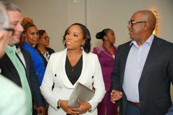 Sagicor’s Assistant Manager, Eastern Caribbean Operations, Deborah Raoul mingles with colleagues during the cocktail reception for ‘An Evening With Our Executives’