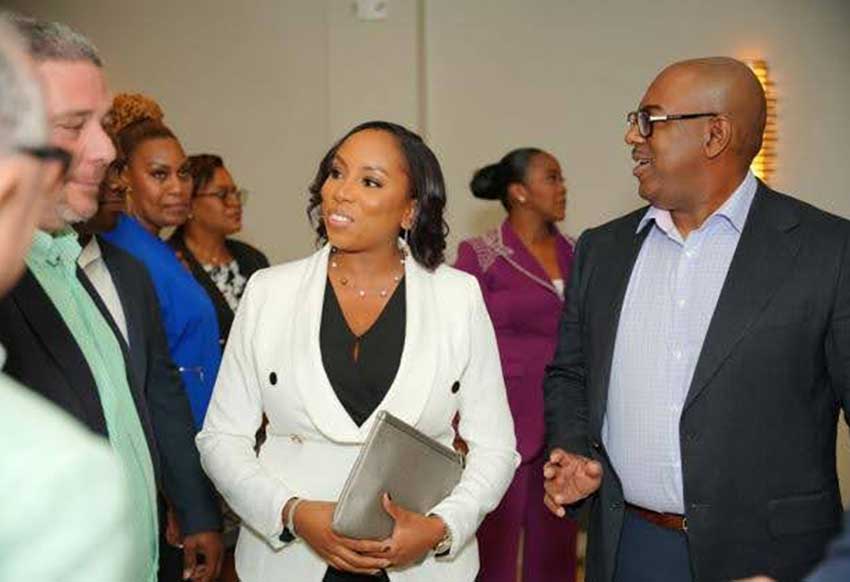 Sagicor’s Assistant Manager, Eastern Caribbean Operations, Deborah Raoul mingles with colleagues during the cocktail reception for ‘An Evening With Our Executives’