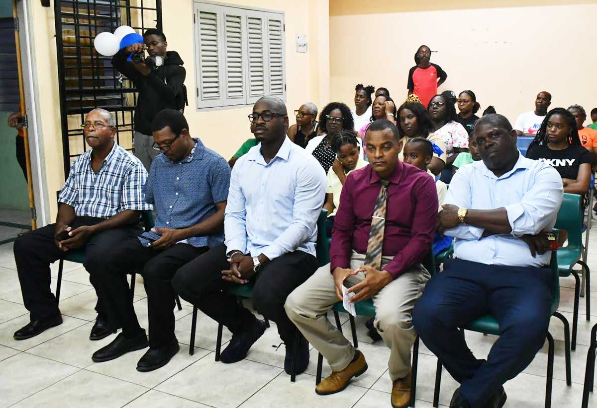 Sports Minister Casimir (centre) alongside government officials [photo credit : MYDS]
