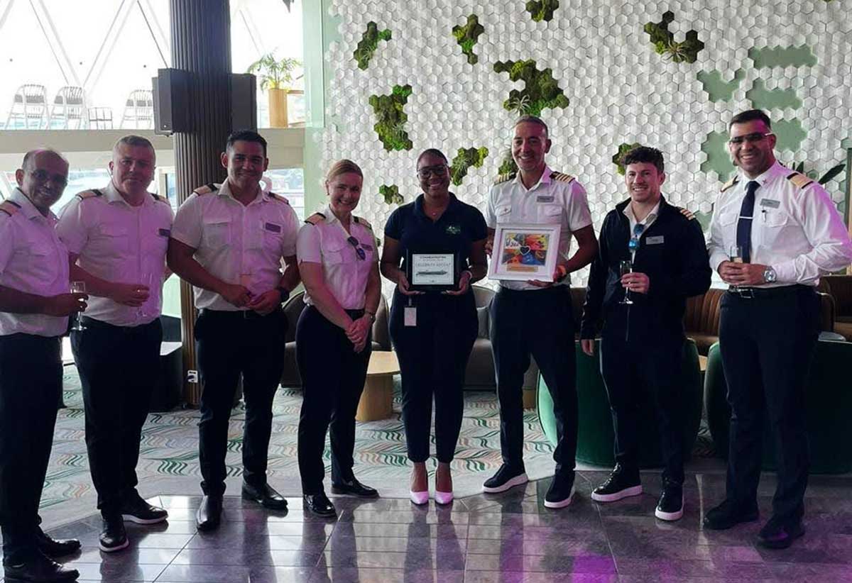 Captain Tasos Kafetzis and Crew of Celebrity Ascent at plaque exchange ceremony on November 25, 2025.