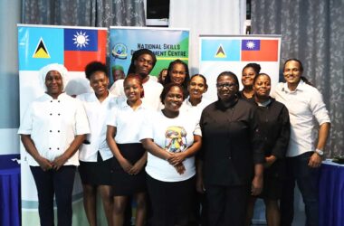 Chef Nicos Anthony, at far right, poses with the chefs from NSDC’s Vieux Fort centre for a group photo.