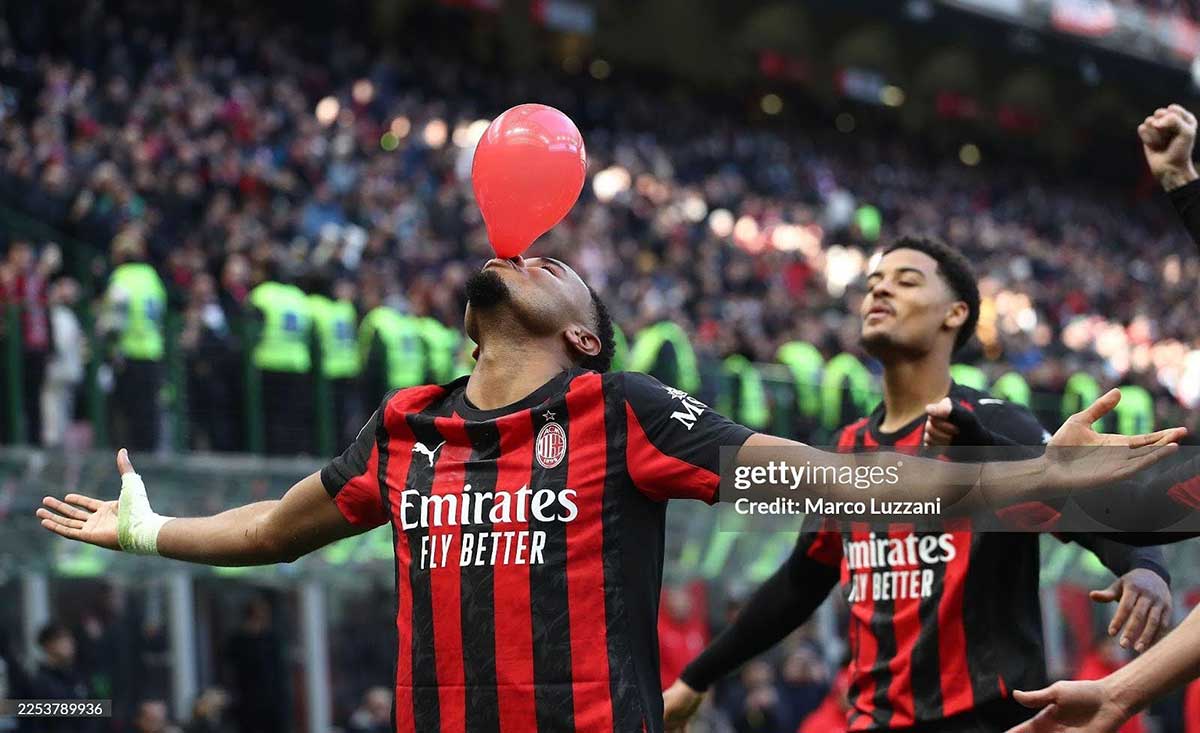 DECEMBER 28: Christopher Nkunku of AC Milan celebrates after scoring their team's second goal from the penalty spot during the Serie A match between AC Milan and Hellas Verona FC at Giuseppe Meazza Stadium on December 28, 2025 in Milan, Italy. (Photo by Marco Luzzani/Getty Images)