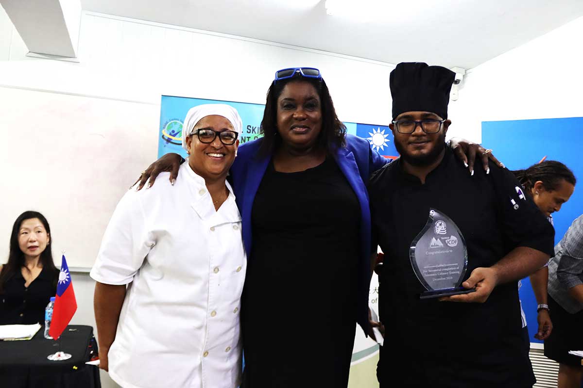 Dr. Selma St. Prix, General Manager of the National Skills Development Centre (NSDC), in centre, with Cindy Houson and Benaniah Ragnanan, winners of Thursday’s competition.