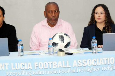Cooper (centre) flanked by CONCACAF’s Lopez (right) and Felix-Toussaint (left).