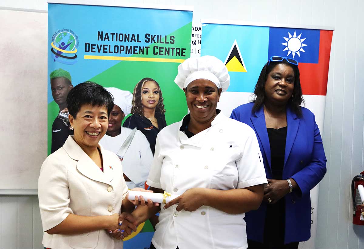 H.E. Nicole Su, Taiwan’s Ambassador to Saint Lucia, far left, presents a certificate of participation to one of the participants. At far right is Dr. Selma St. Prix, General Manager of the National Skills Development Centre (NSDC).