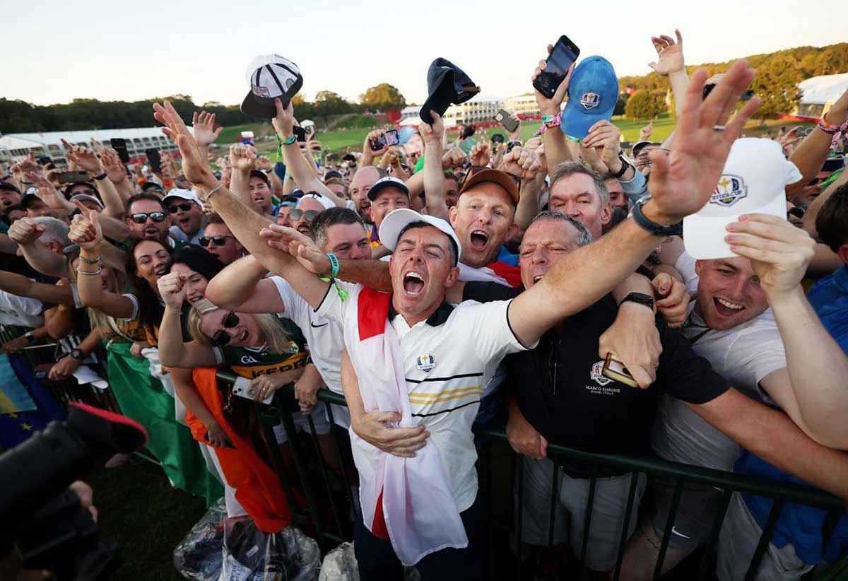 FARMINGDALE, NEW YORK ‑ SEPTEMBER 28: Rory McIlroy of Team Europe celebrates with fans after Team Europe's 15‑13 win over Team America during the trophy presentation ceremony after the Sunday singles matches of the 2025 Ryder Cup at Black Course at Bethpage State Park Golf Course on September 28, 2025 in Farmingdale, New York. [Photo by Maddie Meyer/PGA of America]