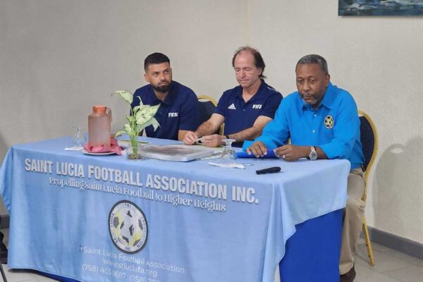 SLFA President Lyndon Cooper and FIFA facilitators [Photo credit : SLFA]