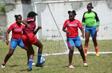 Action in the first encounter of the tournament between canaries and Dennery