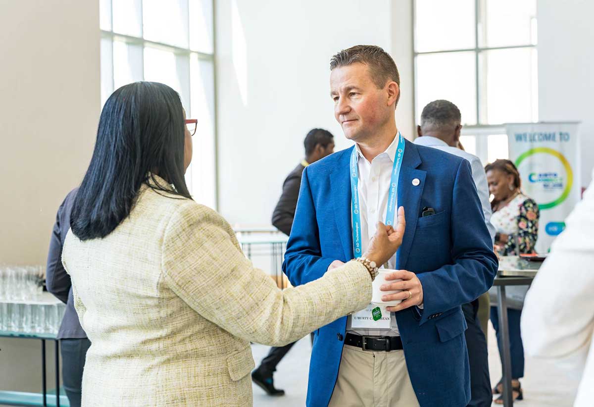 Dominic Boon, VP, People, Liberty Caribbean engages Teresa Wankin, Secretary General of CANTO, on the sidelines of the Human Resource (HR) Leadership Forum.