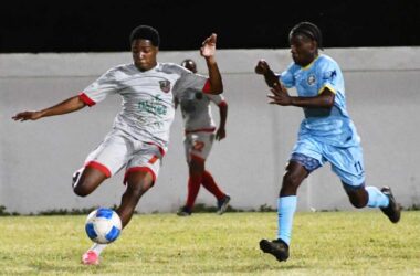 New Generation FC (white and orange) took on Gros Islet Youth Lions (Photo credit: MYDS)