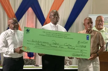 L to R: Rev. David Popo – Director of the ABKFAPC; Archbishop Gabriel Malzaire of the Province of Castries; Mr. Julius James – Chairperson of the GEF SGP UNDP National Steering Committee; and in the back Mr. Giles Romulus - National Coordinator GEF SGP UNDP (Saint Lucia).