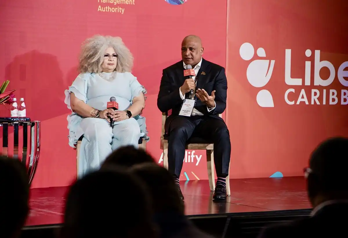 The Hon. Dr Ernest Hilaire, Deputy Prime Minister of Saint Lucia makes a point to fellow speaker Dr. Maria Myers-Hamilton, Managing Director, Spectrum Management Authority, during the panel discussion ‘Connectivity in Crisis, Resilience for the Future’.